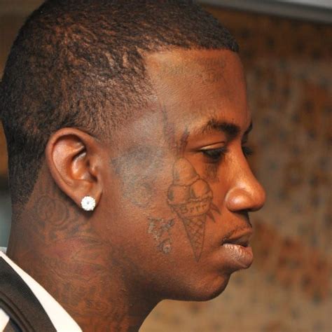 gucci mane face tattoos